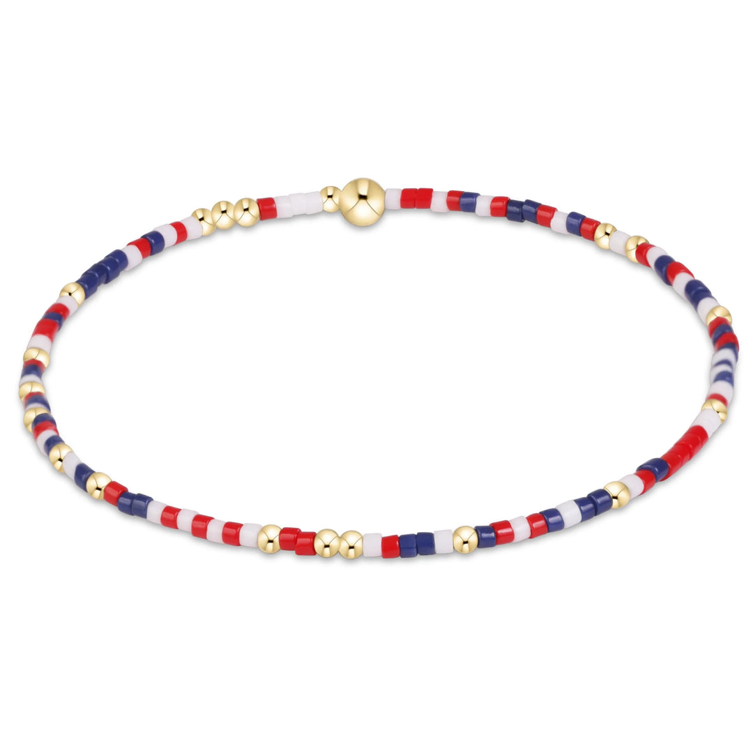 bracelet with red, white, and blue beads on a white background