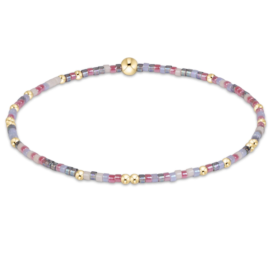 various colors of randomly mixed 2mm seed beads and 2mm, 14k gold-filled beads