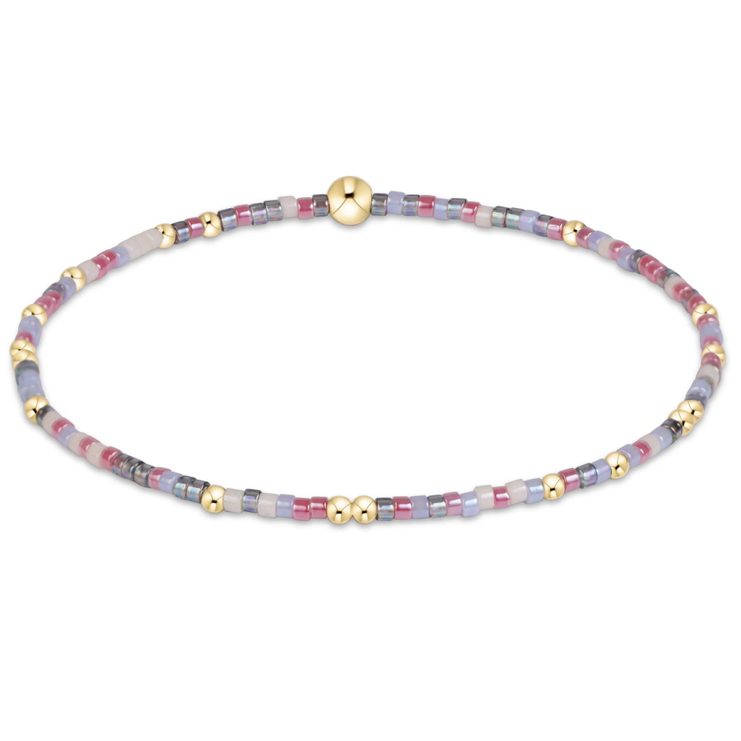 various colors of randomly mixed 2mm seed beads and 2mm, 14k gold-filled beads