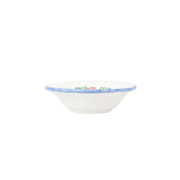 White ceramic bowl with colorful rim on a white background