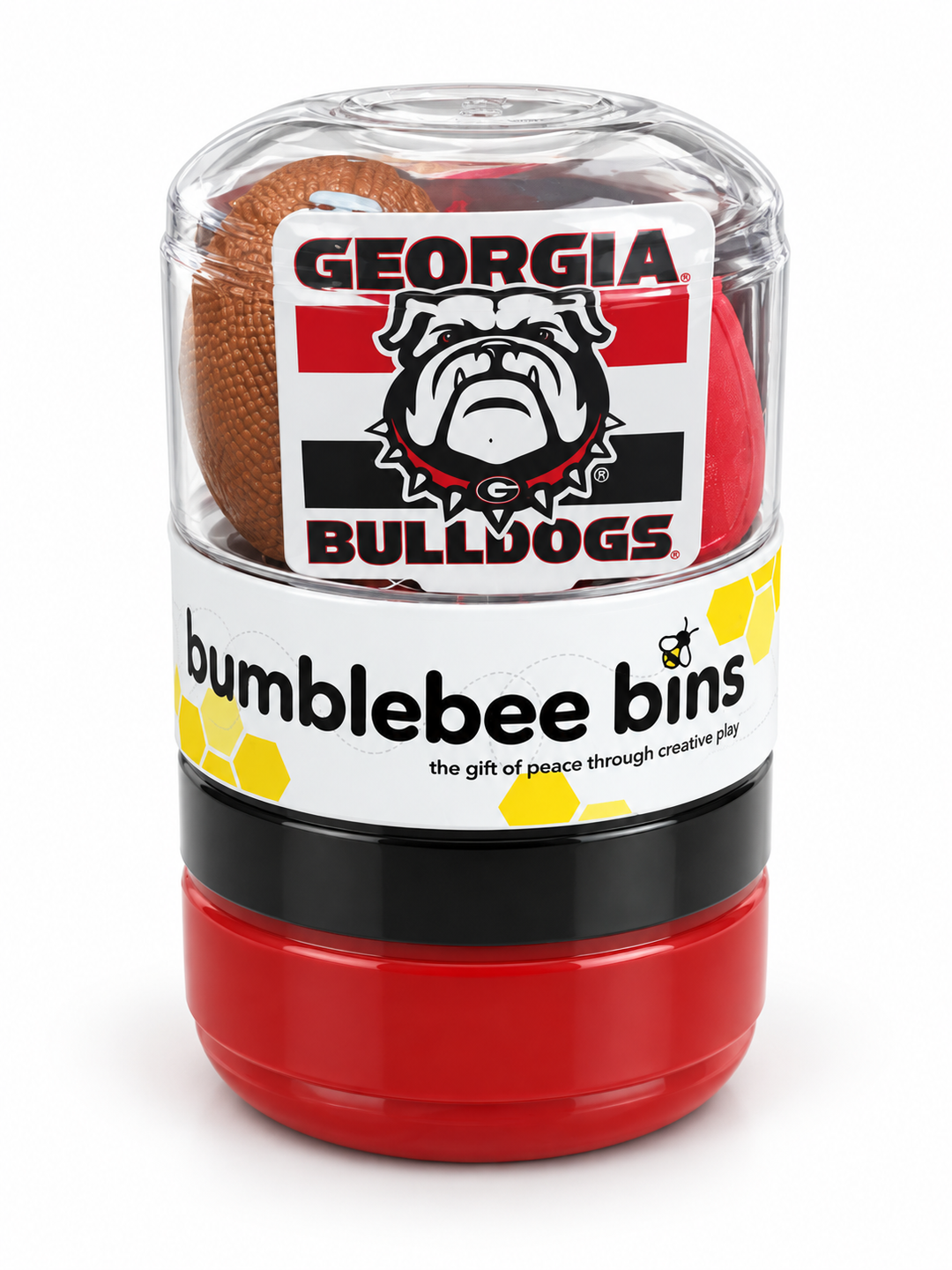 A clear cylindrical container labeled 'bumblebee bins' with a Georgia Bulldogs logo, containing stacked red and brown balls, photographed on a white background.