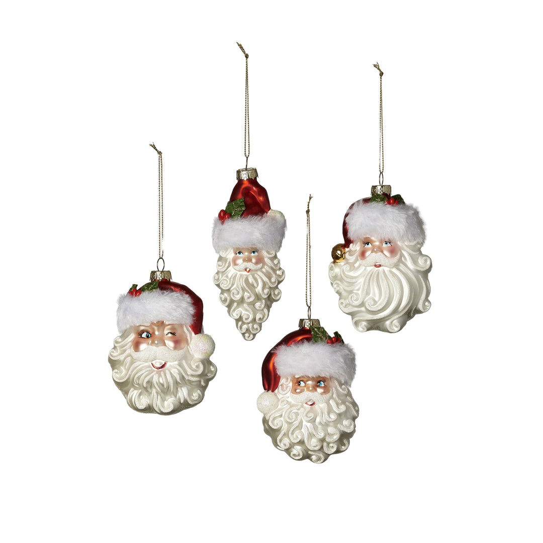 FOUR SANTA HEAD ORNAMENTS ON WHITE BACKGROUND