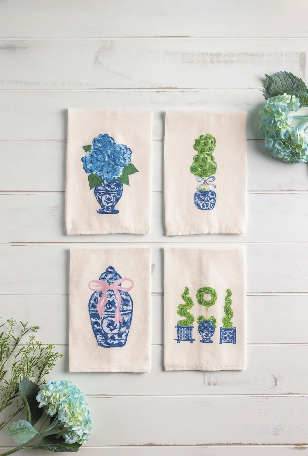 FOUR HAND PAINTED CHINOISERIE HAND TOWELS ON WOODEN BACKGROUND