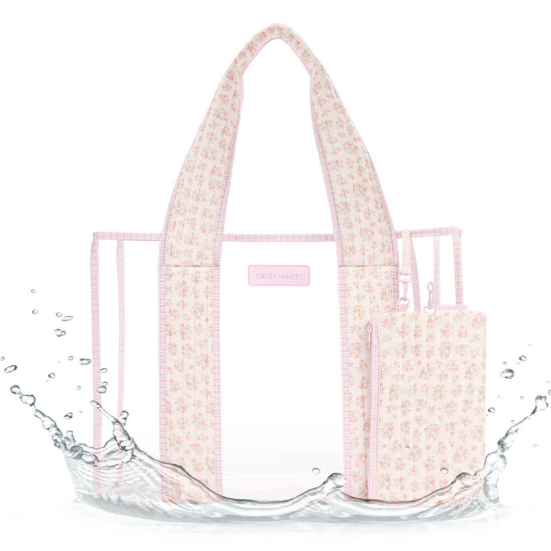 CLEAR JELLY TOTE WITH PINK FLORAL STRAP AND TRIM WITH MATCHING INTERIOR POUCH