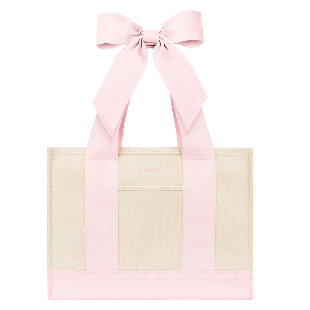 CANVAS TOTE WITH PINK TRIM AND BOW DETAIL ON TRANSPARENT BACKGROUND