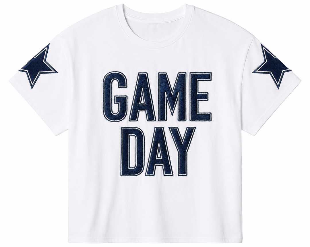 White t-shirt with 'GAME DAY' text and star designs on sleeves against a white background