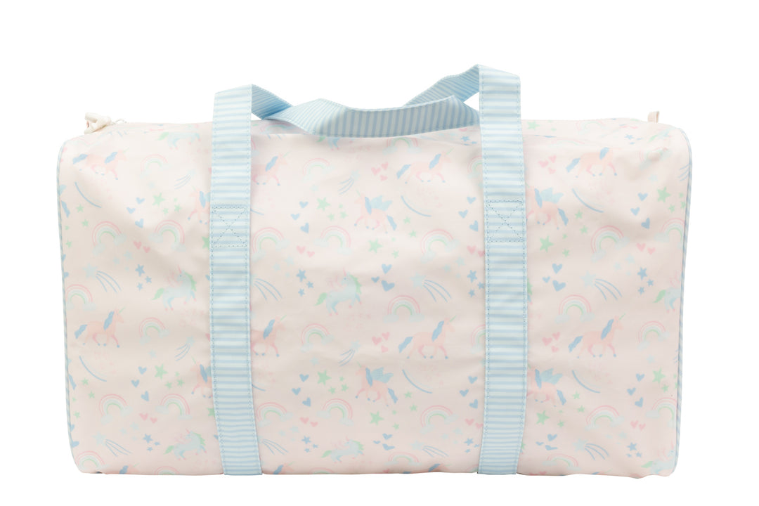 PINK DUFFLE BAG WITH UNICORN PRINT ALL OVER AND BLUE STRAPS ON WHITE BACKGROUND