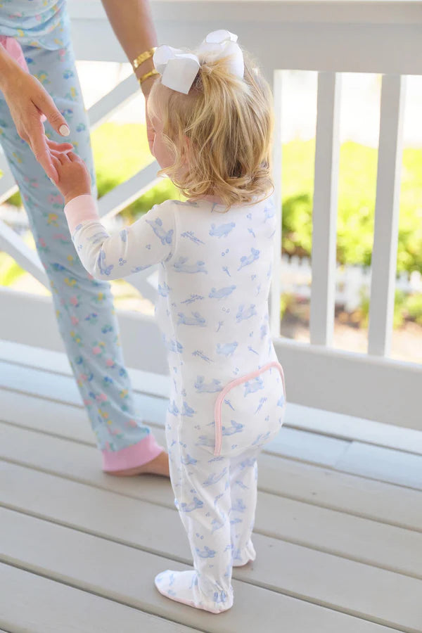 PINK AND BLUE AND WHITE LONG SLEEVE GIRLS FOOTIE ON LITTLE BLONDE CHILD