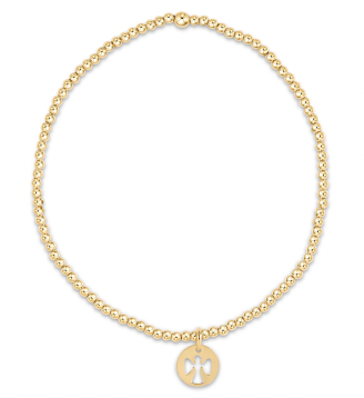 Gold bracelet with a peace symbol charm on a white background