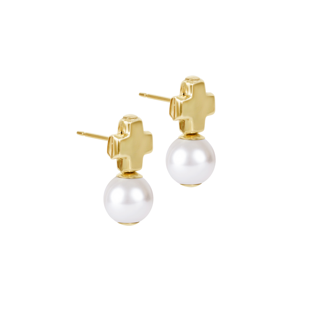 Gold earrings with white pearls on a white background