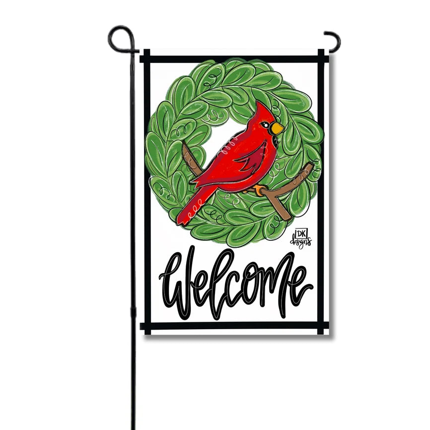 Garden flag with a red cardinal bird on a green wreath and 'Welcome' text.
