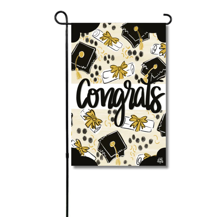 Decorative garden flag with graduation-themed design and 'Congrats' text on a white background.