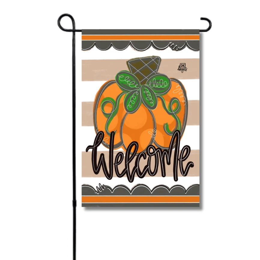 Decorative garden flag with a pumpkin and 'Welcome' text on a striped background.