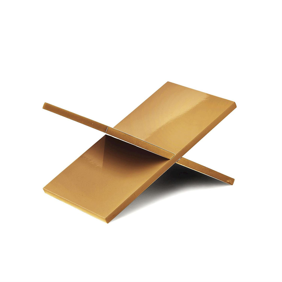 Gold-colored bookend on a white background