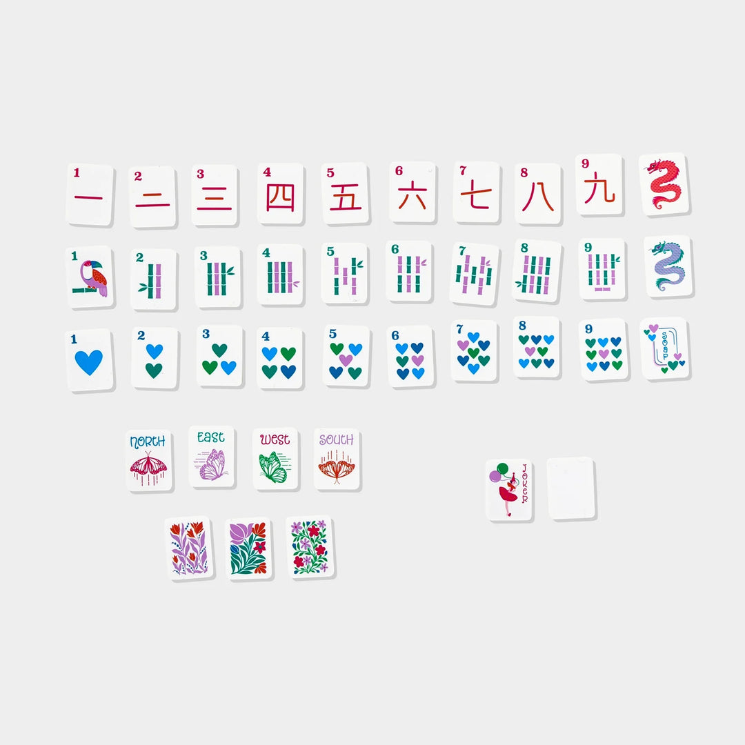 Mini Mahjer playing tiles featuring colorful suits, winds, dragons, flowers, and joker tiles. | Walker Boutique