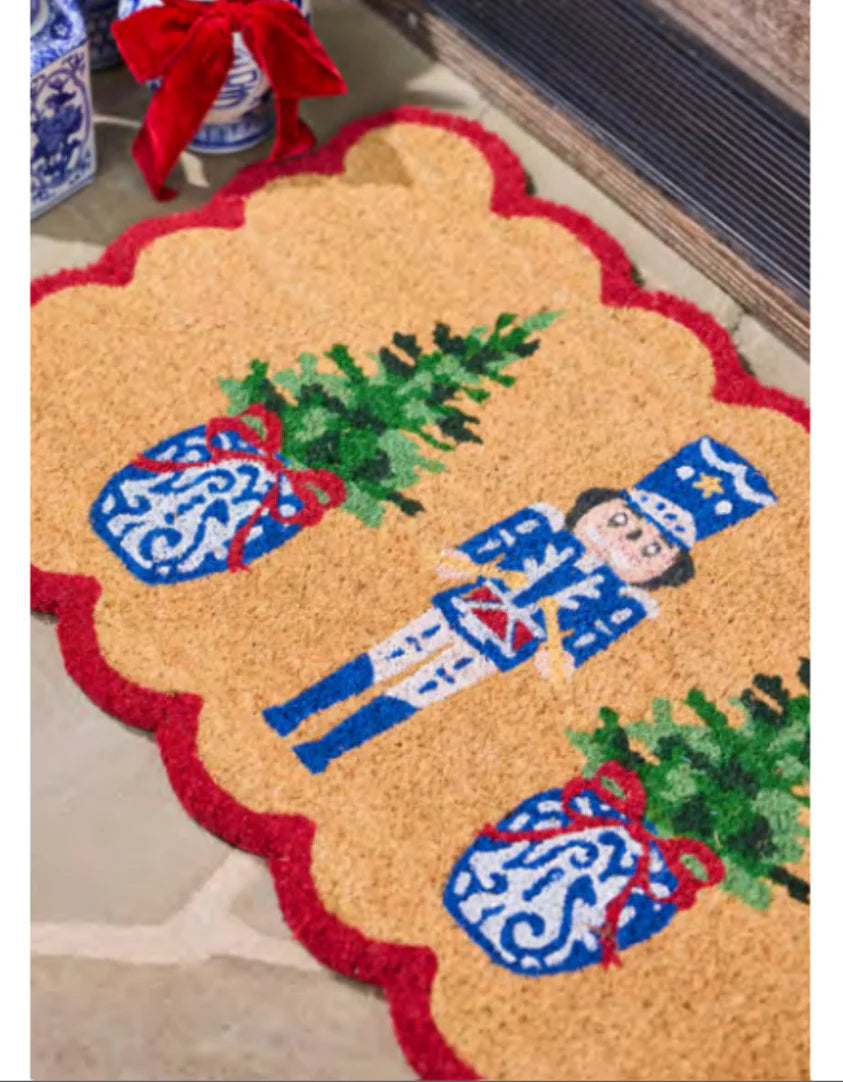 blue and white nutcracker door mat