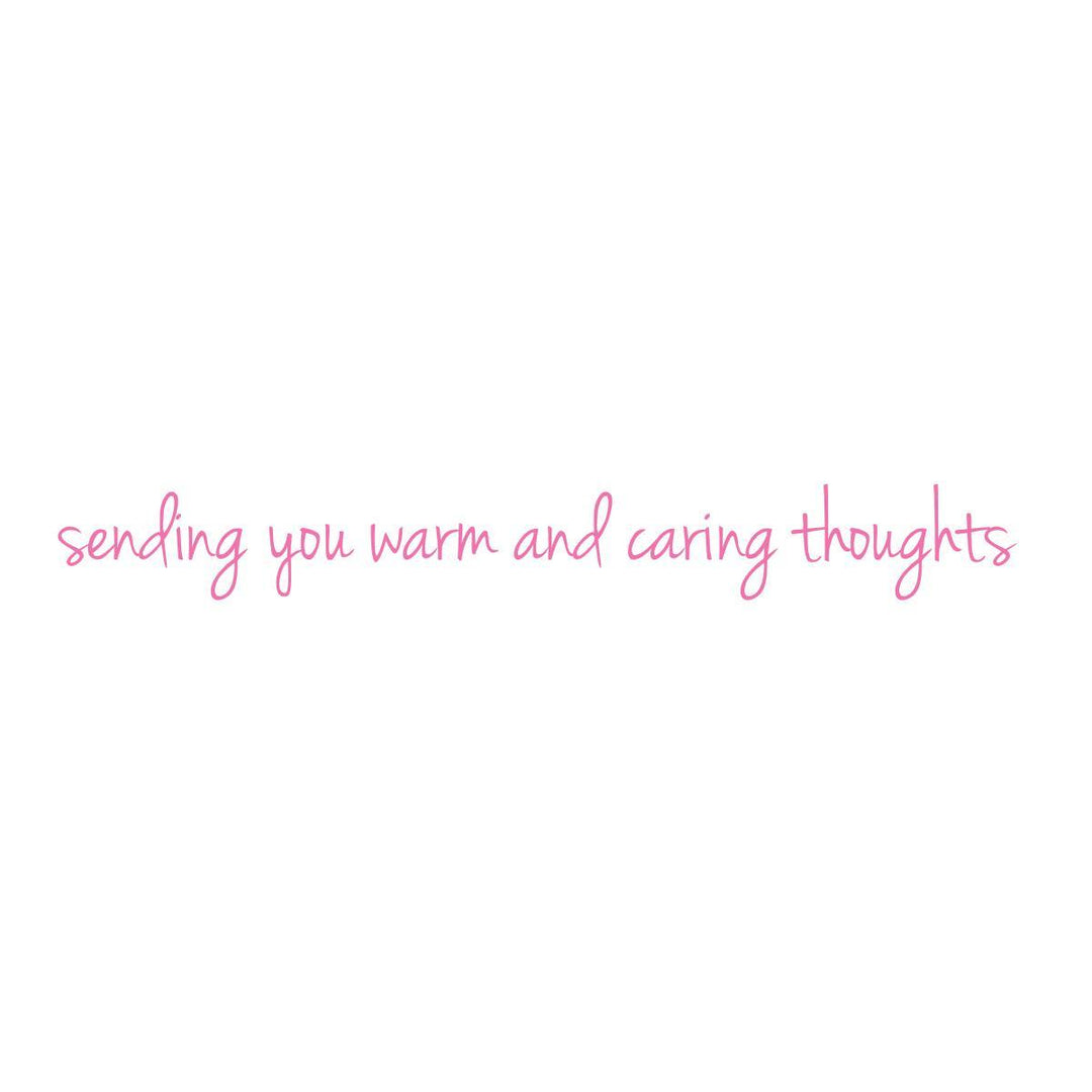 Pink cursive text reading 'sending you warm and caring thoughts' centered on a plain white background.