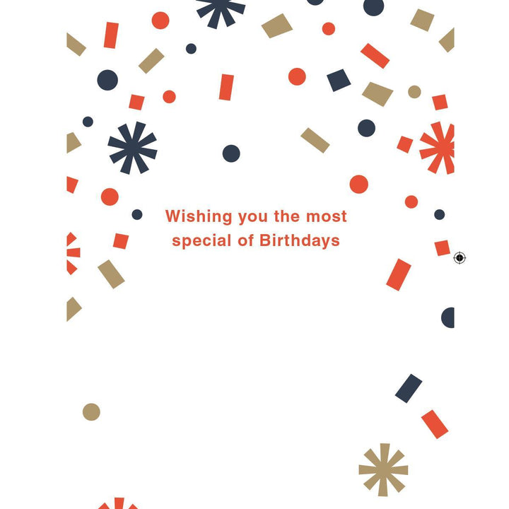 A white greeting card design with scattered confetti shapes in red, navy, and tan, plus the text 'Wishing you the most special of Birthdays' in red near the center.