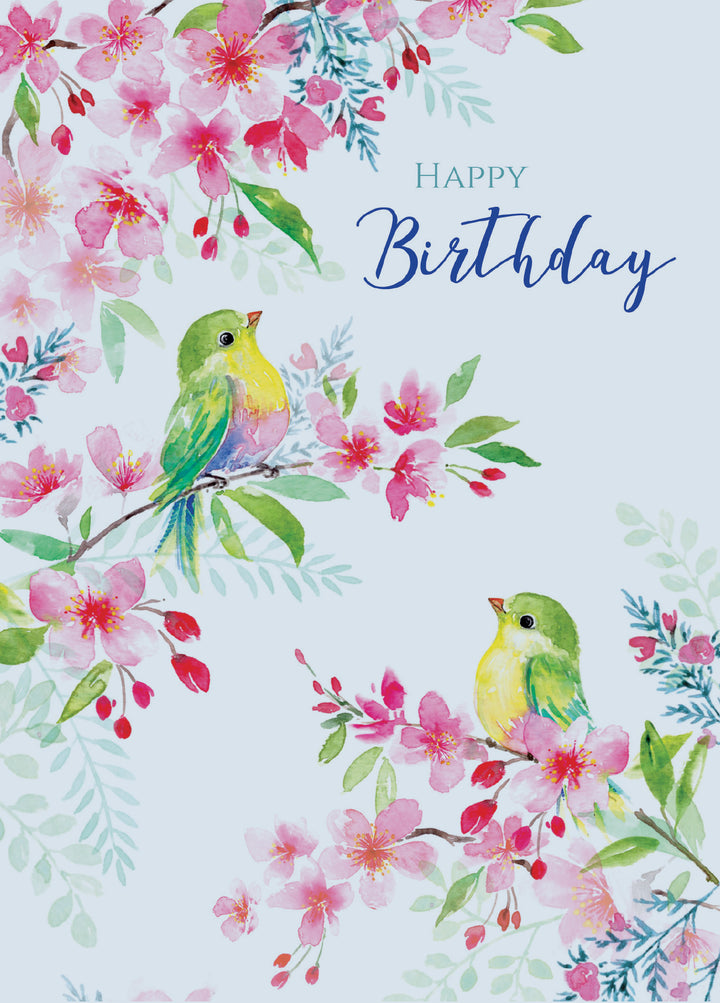 A watercolor-style Happy Birthday greeting card design with pink blossoms, green leaves, two small yellow-green birds, and blue script text reading 'Happy Birthday' on a pale blue background.