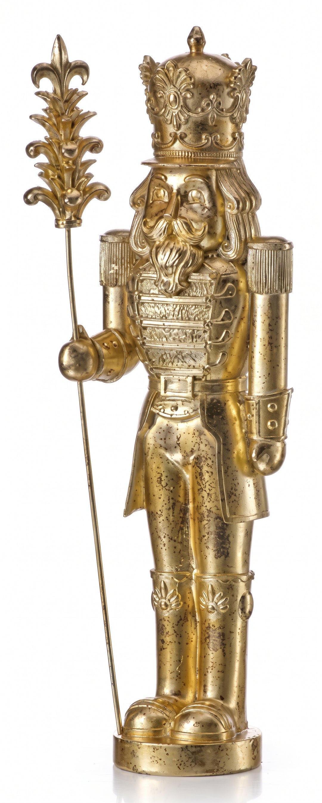 A metallic gold Christmas nutcracker figurine with a crown, holding a decorative staff, shown against a plain white background.