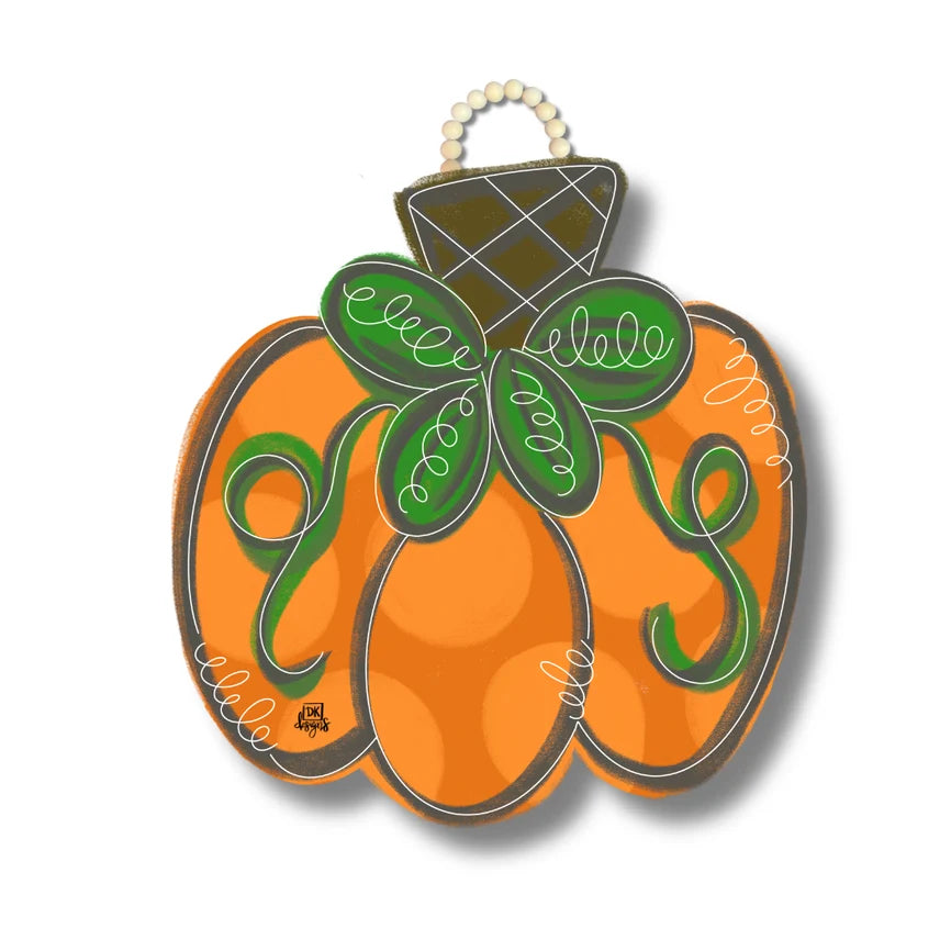 Decorative pumpkin-shaped ornament with green leaves and 'elle' text on a white background
