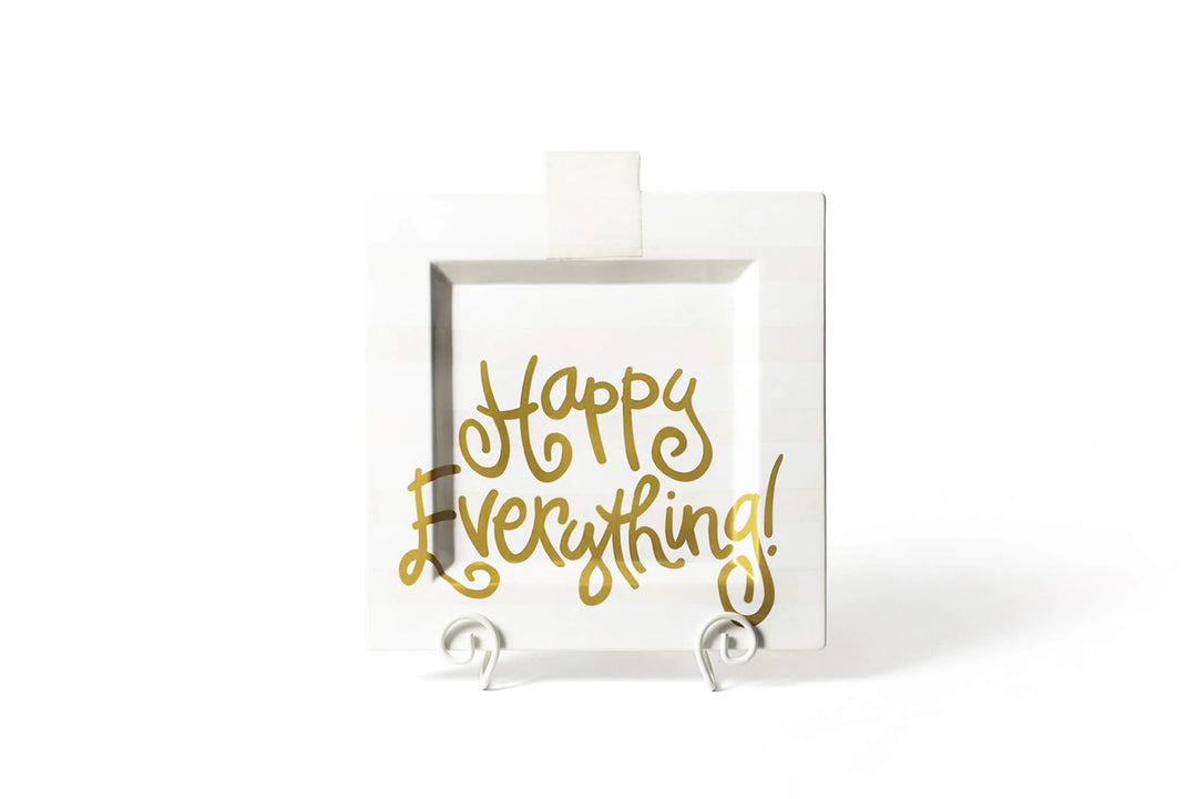 Square white tray with 'Happy Everything!' text in gold on a white background