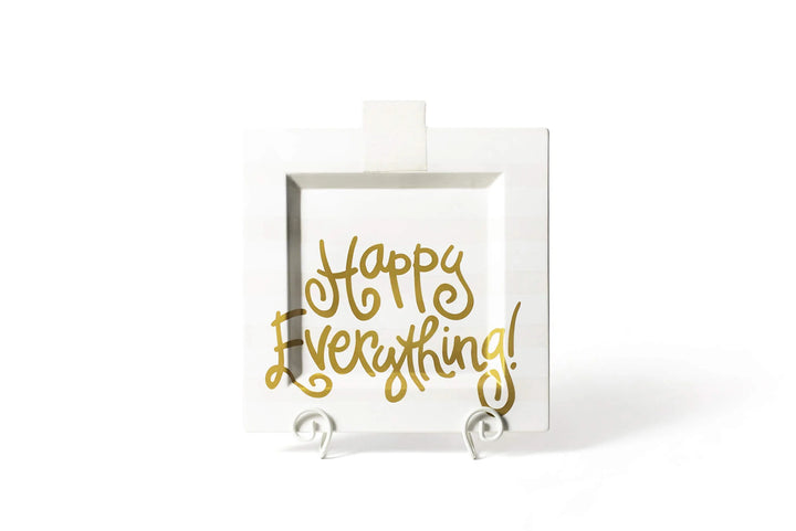 Square white tray with 'Happy Everything!' text in gold on a white background