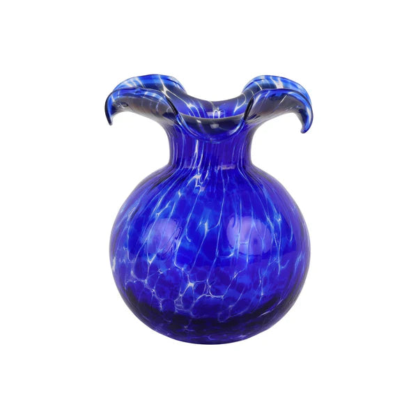 Blue glass vase with a wavy rim on a white background