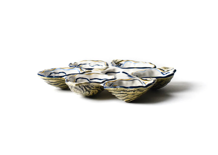 Set of ceramic oyster shells on a white background