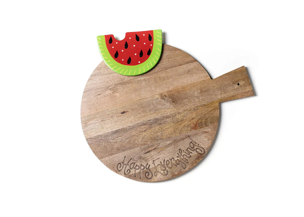 Wooden cutting board with a watermelon-shaped cutting tool on a white background