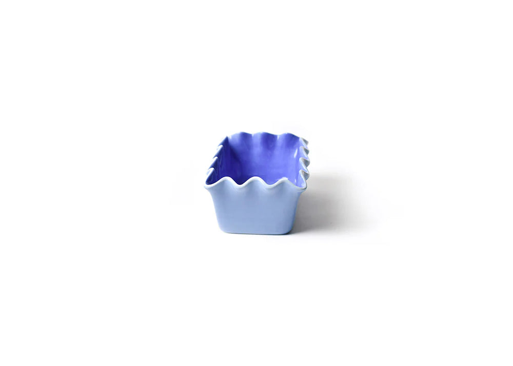 blue ruffled loaf pan on white background