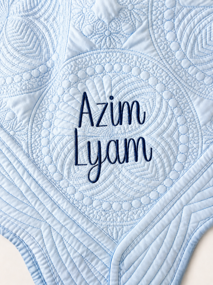 BABY AZIM WILSON-WILLIAMS: CUSTOM LIGHT BLUE HEIRLOOM QUILT
