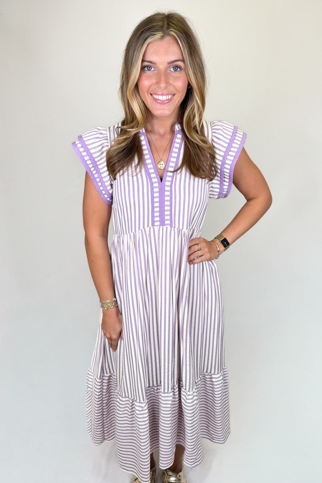 Lavender and white striped midi dress with ruffle sleeves and tiered skirt | Walker Boutique