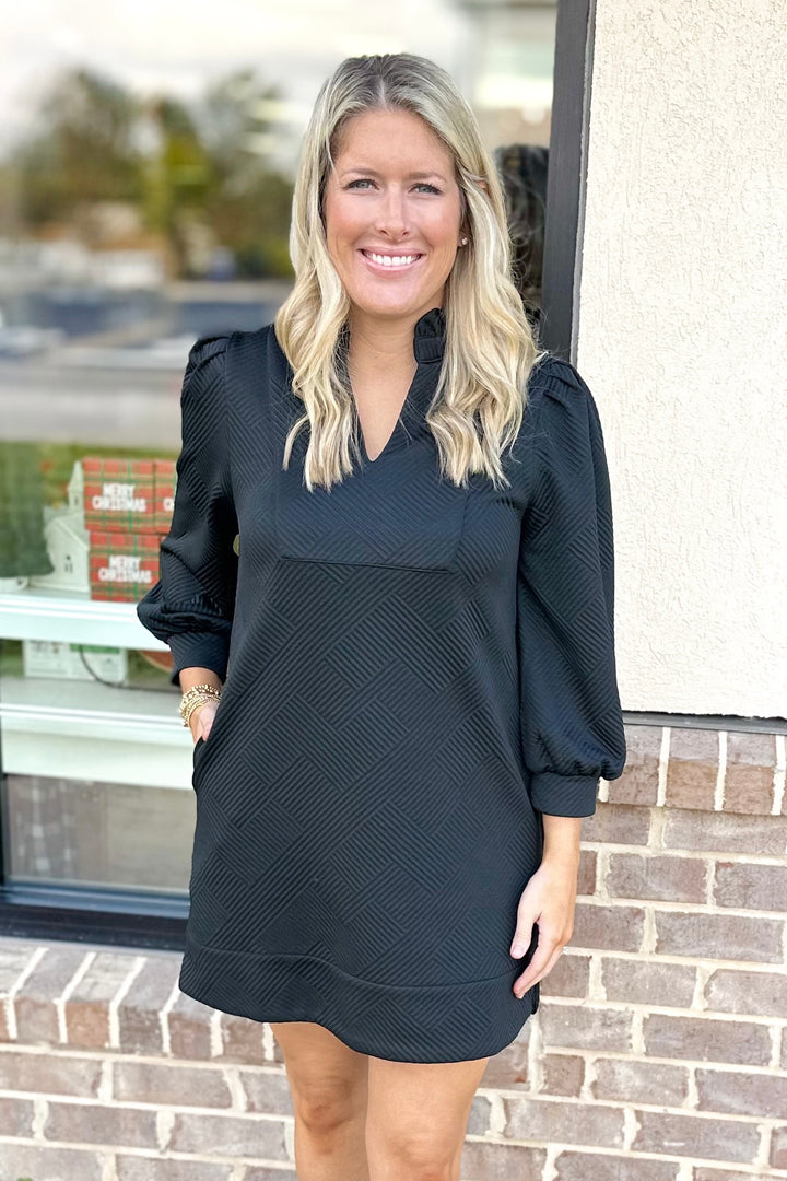 BLACK TEXTURED FRILL NECK VNECK DRESS