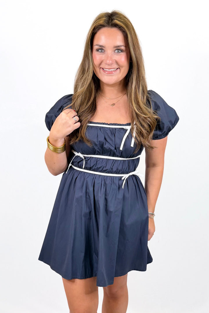 NAVY PLEATED BOW TRIM BABYDOLL DRESS