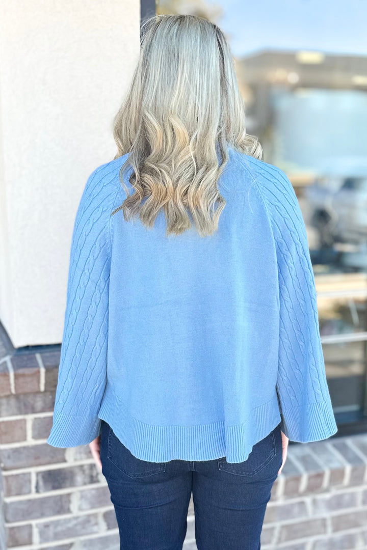 POWDER BLUE CABLE KNIT SWING SWEATER