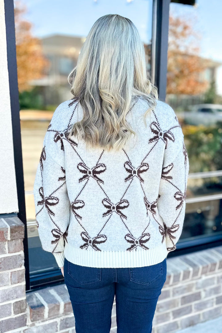 BROWN & IVORY BOW PATTERN SWEATER