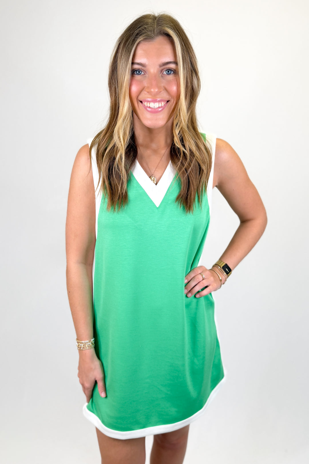 Woman wearing a green casual dress.