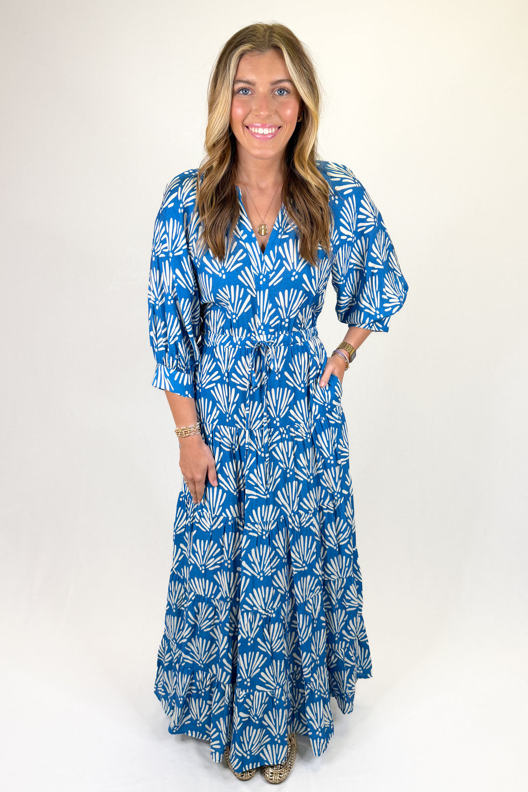 Blue and white shell print maxi dress with puff sleeves, tiered skirt and drawstring waist, coastal inspired statement dress perfect for spring and summer