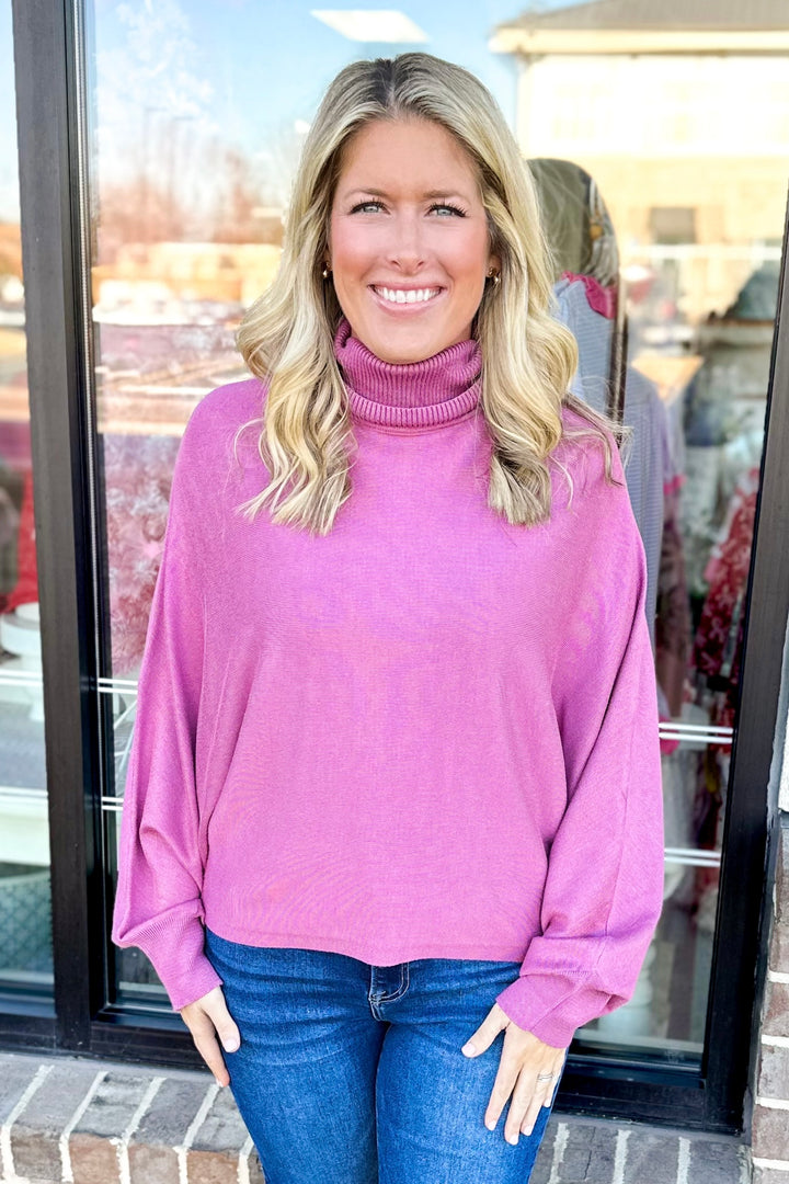 PINK SWING RIBBED TURTLENECK SWEATER