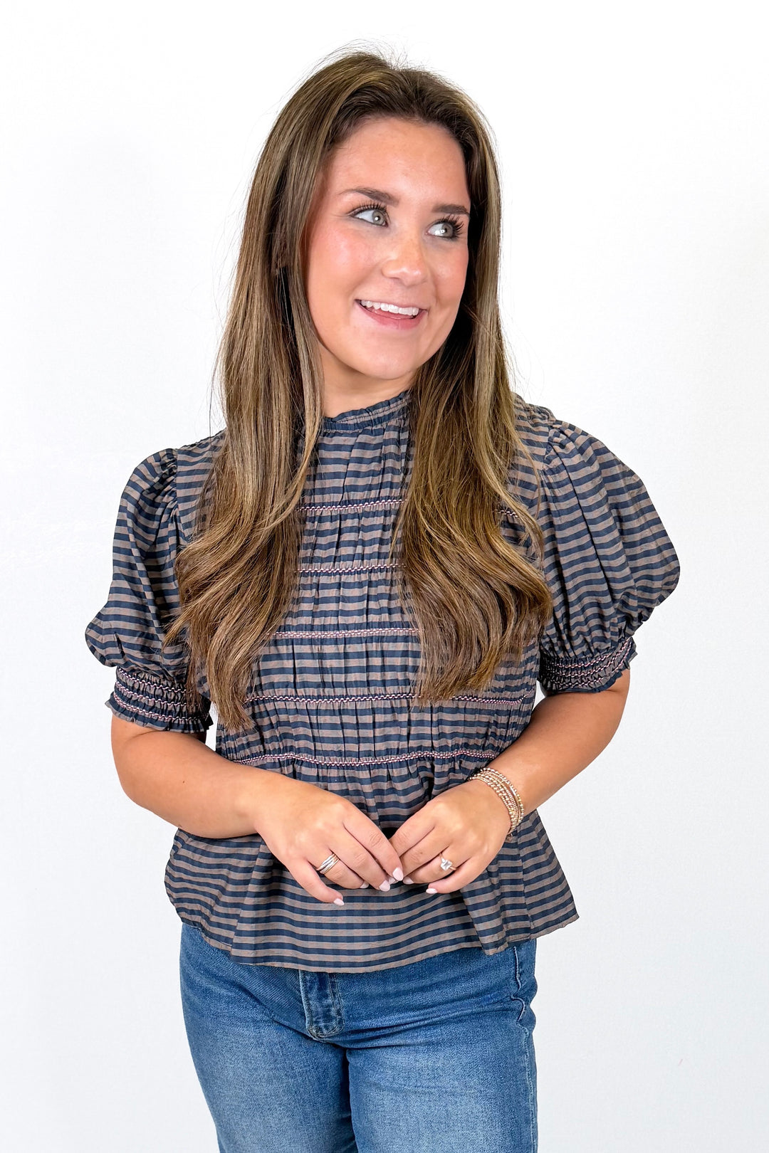NAVY STRIPE SMOCKED PEPLUM TOP
