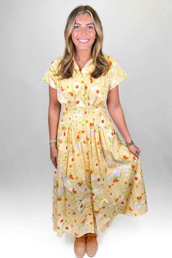 Yellow floral midi dress for women with button front and cinched waist boutique spring outfit