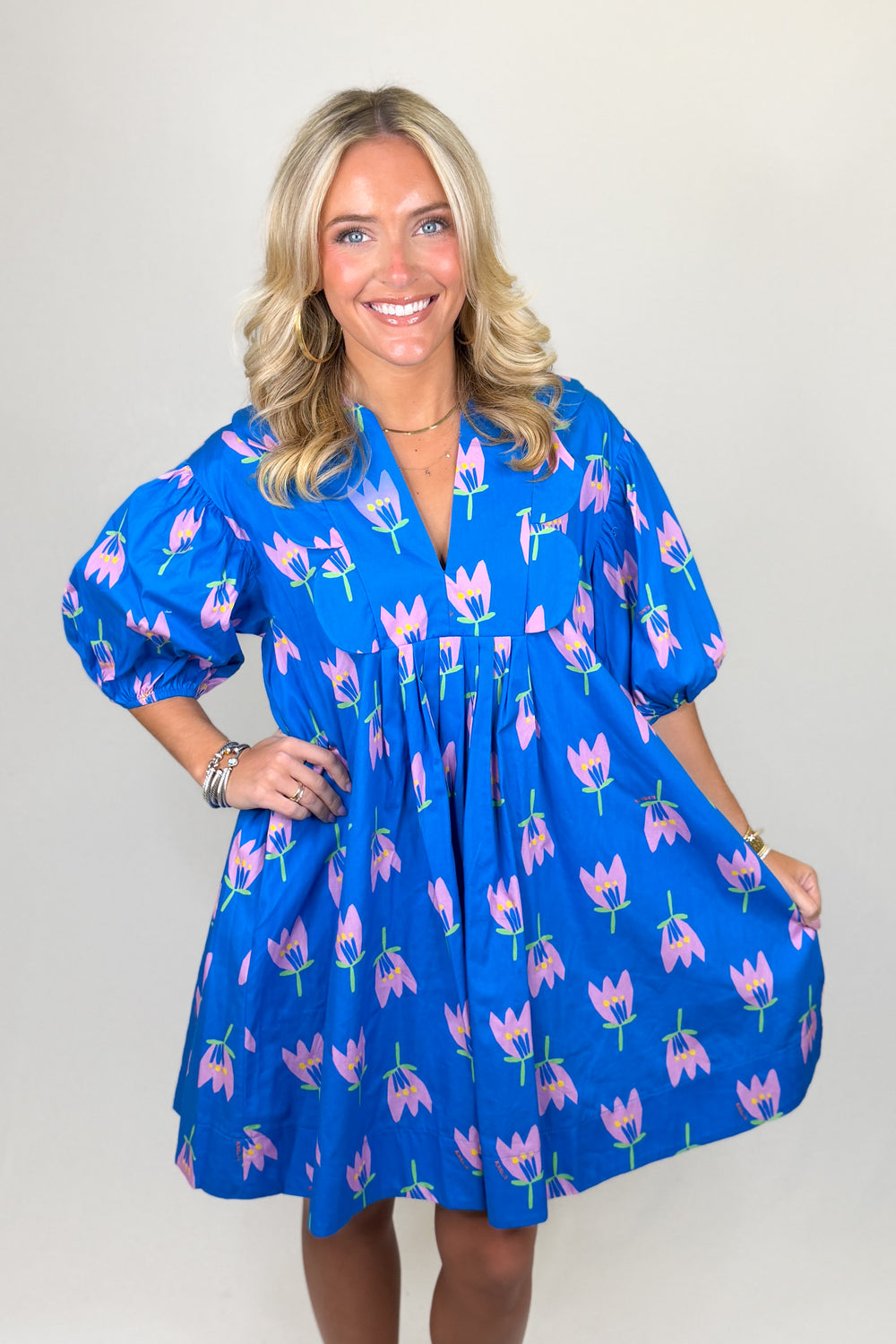 Blue floral mini dress for women with puff sleeves and flowy silhouette boutique spring outfit