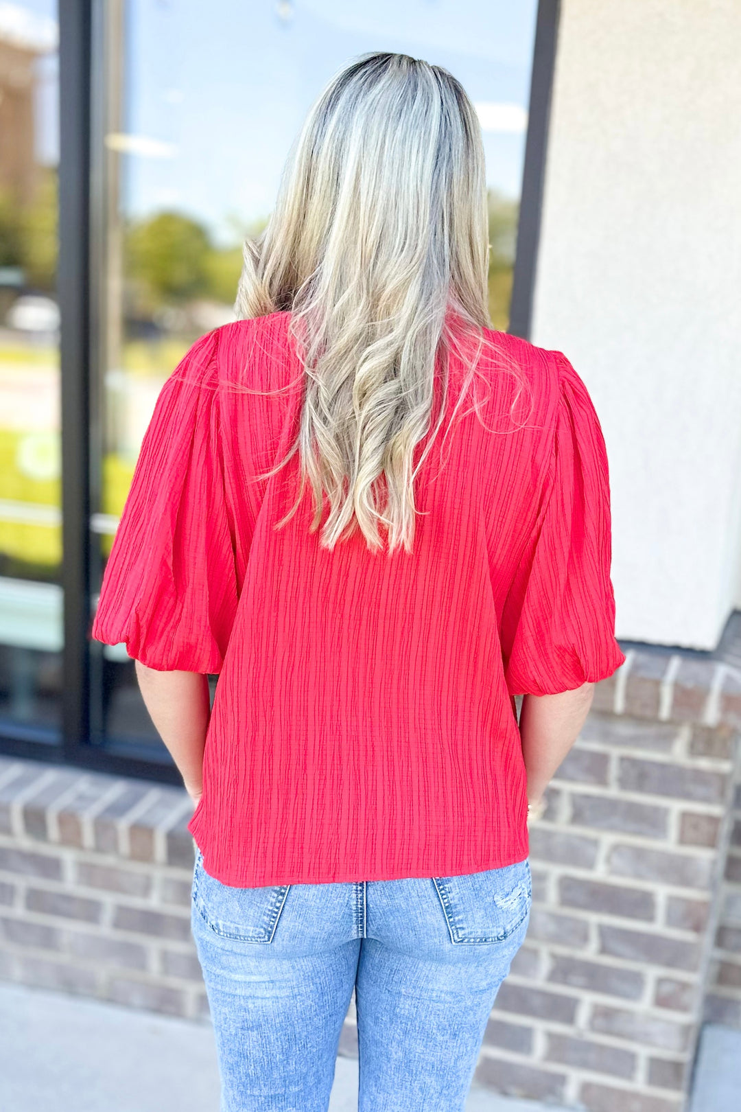 CORAL TEXTURED VNECK PUFF SLEEVE TOP