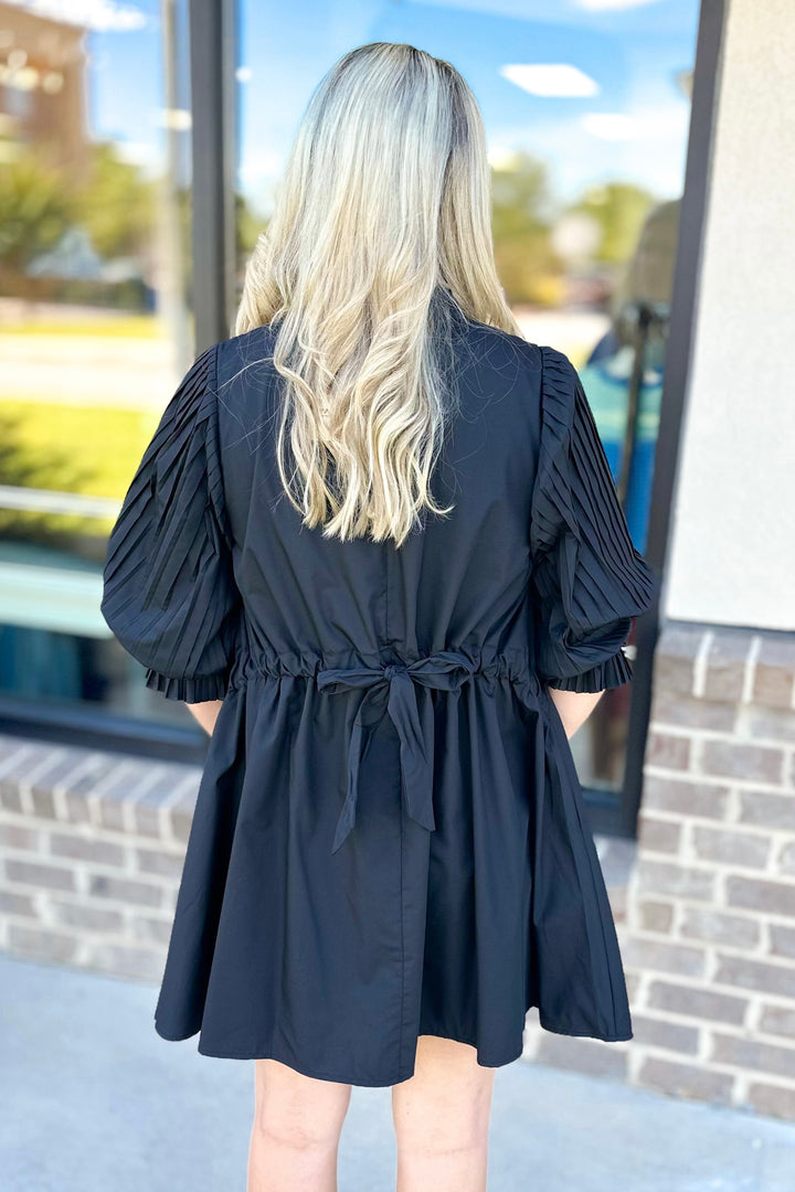 BLACK PLEATED HALF SLEEVE TIE BACK DRESS