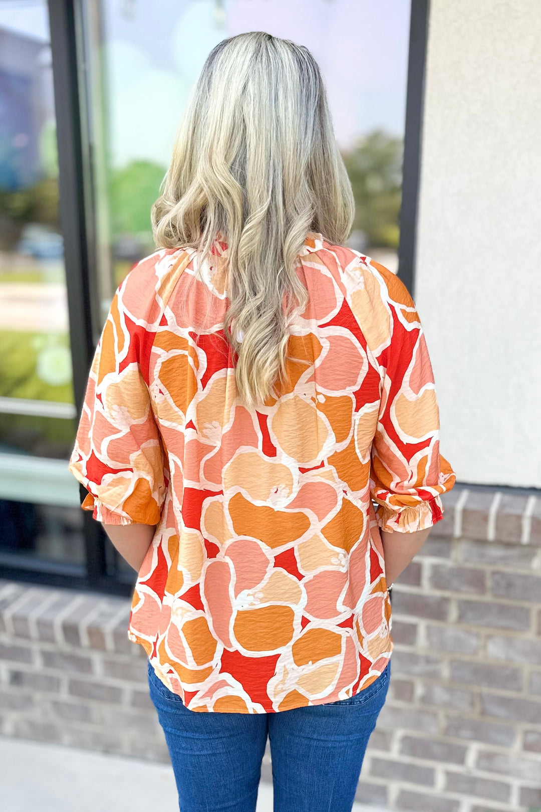 ORANGE ABSTRACT PINTUCK DETAIL TOP