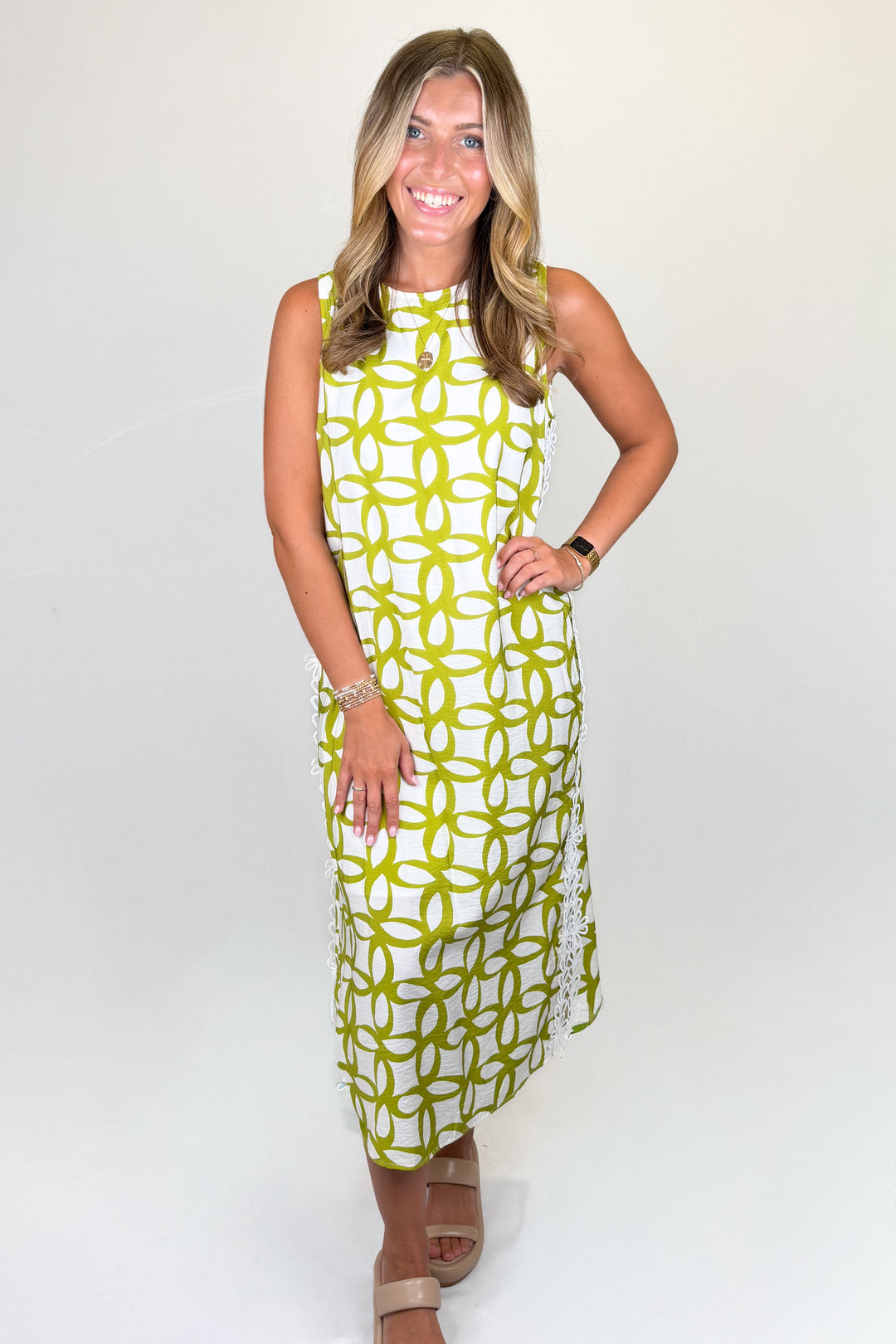 Green and white sleeveless midi dress with geometric floral print | Walker Boutique
