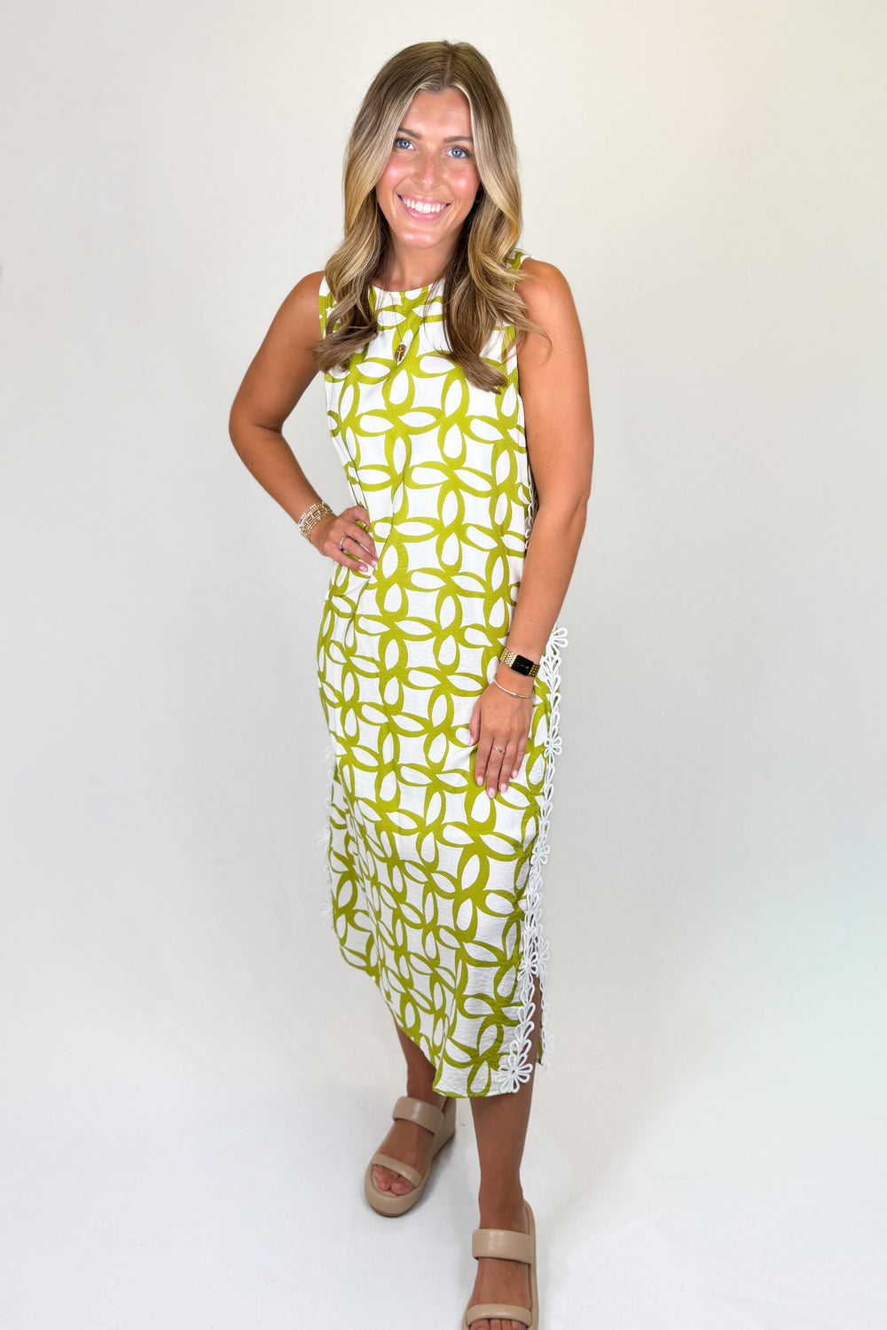 Green and white sleeveless midi dress with geometric floral print | Walker Boutique