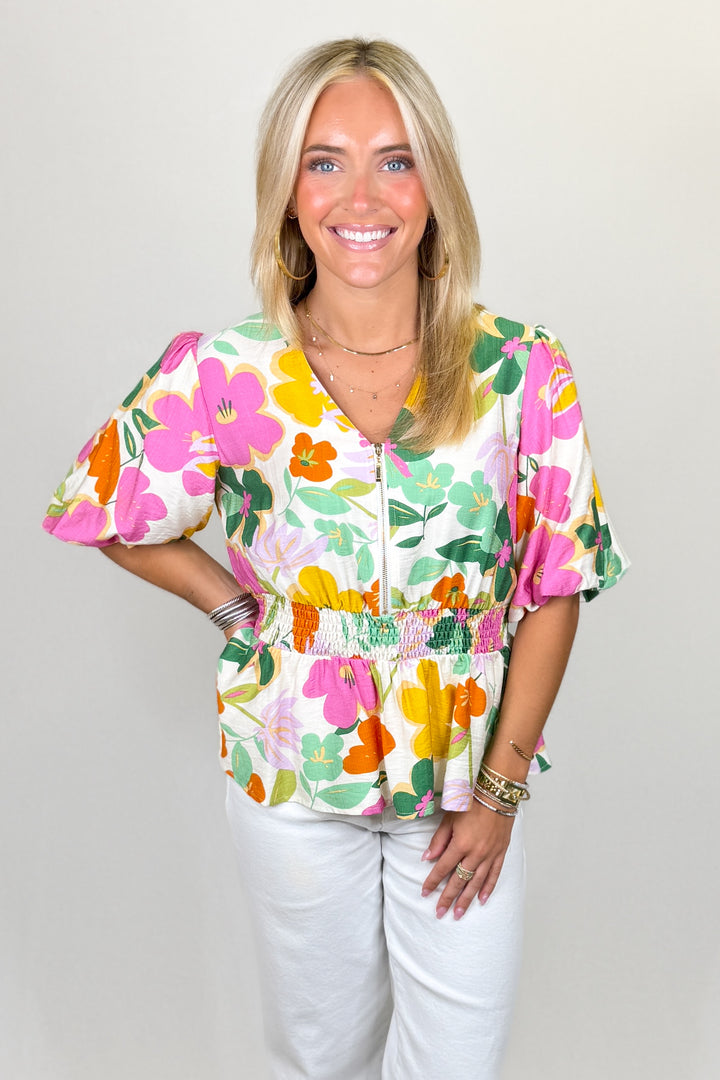Multicolor floral blouse with smocked waist and short puff sleeves v-neck top | Walker Boutique