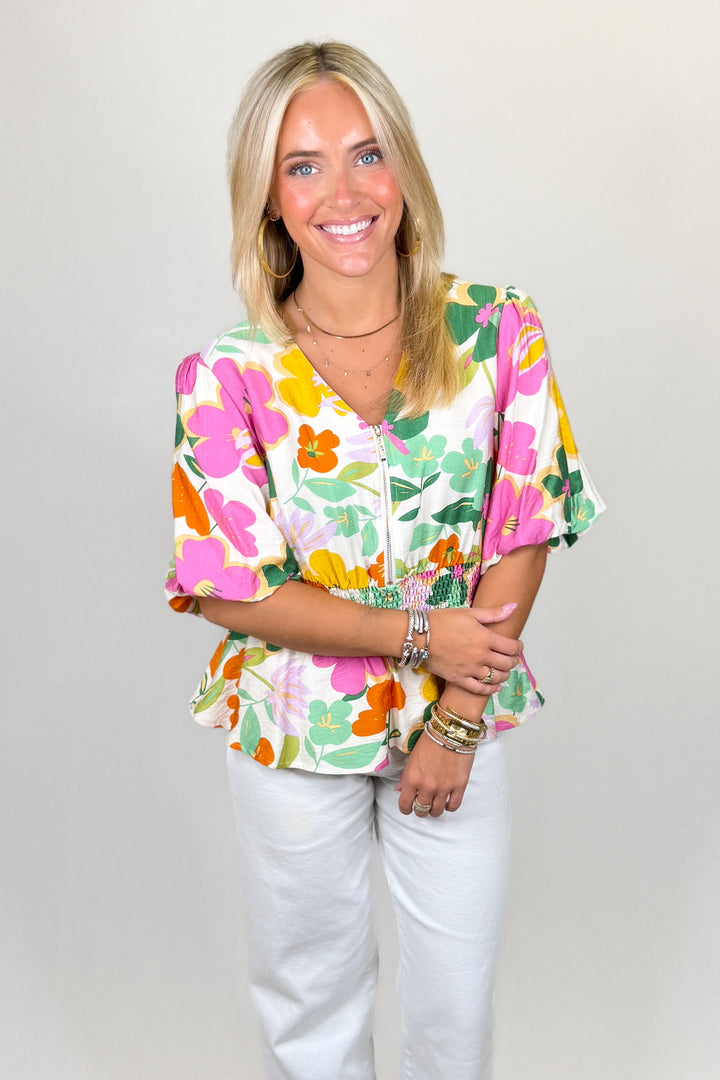 Multicolor floral blouse with smocked waist and short puff sleeves v-neck top | Walker Boutique